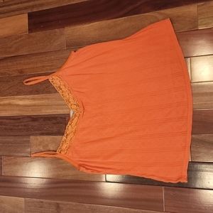 Women's orange tank top with lace trim